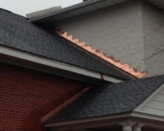 asphalt shingles on brick building