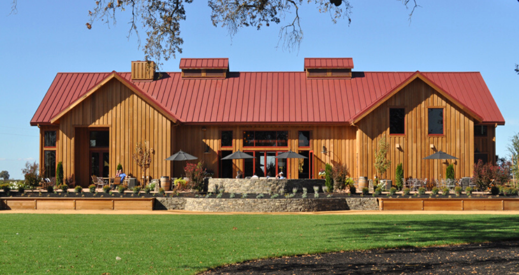 Deep red metal roof color on barn house